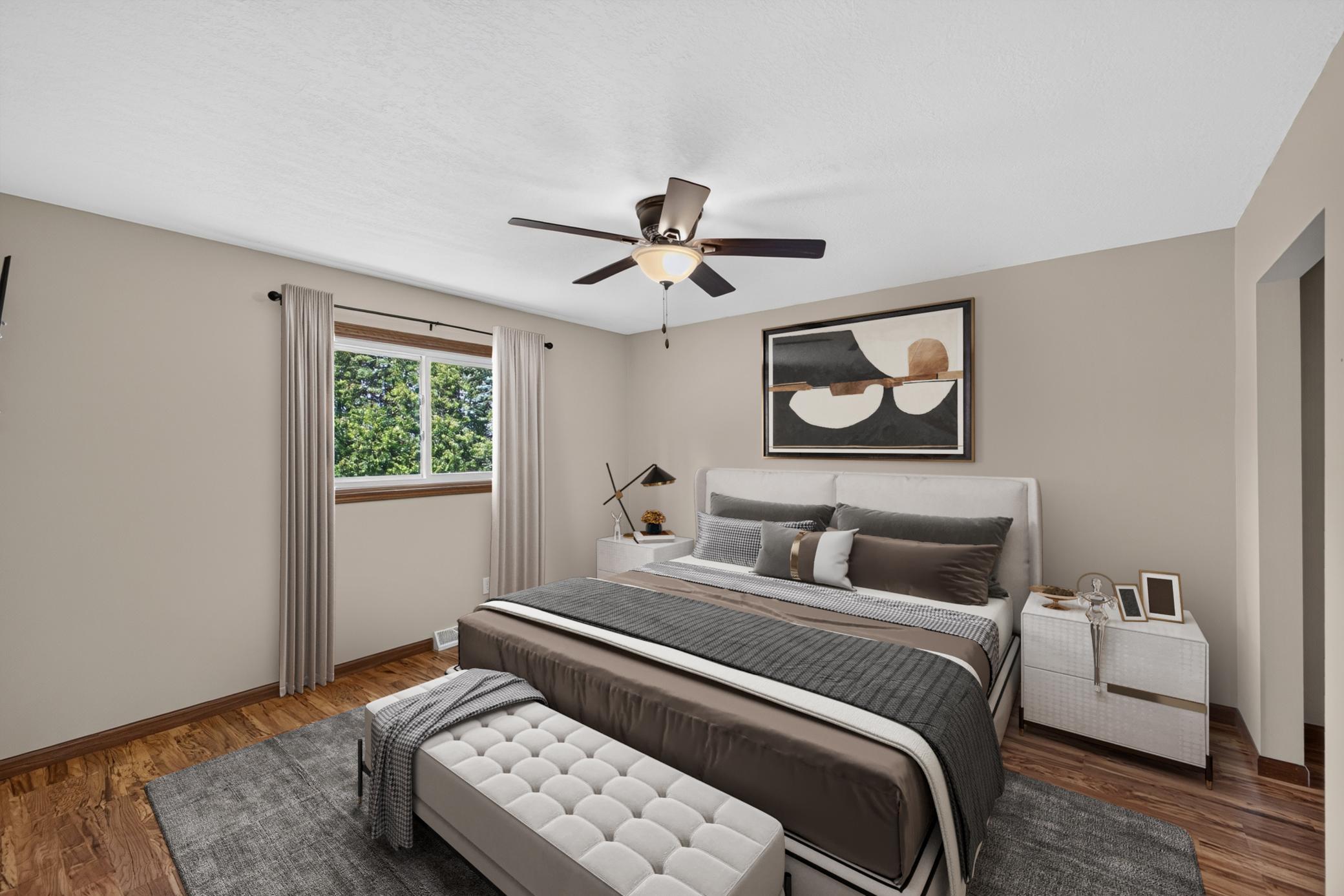 Large master bedroom easily acommodates a king size bed.