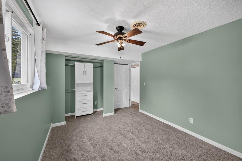 Nice built-ins in closet for maximizing storage.