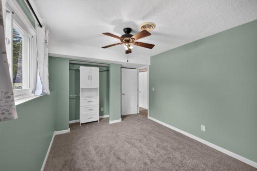 Nice built-ins in closet for maximizing storage.