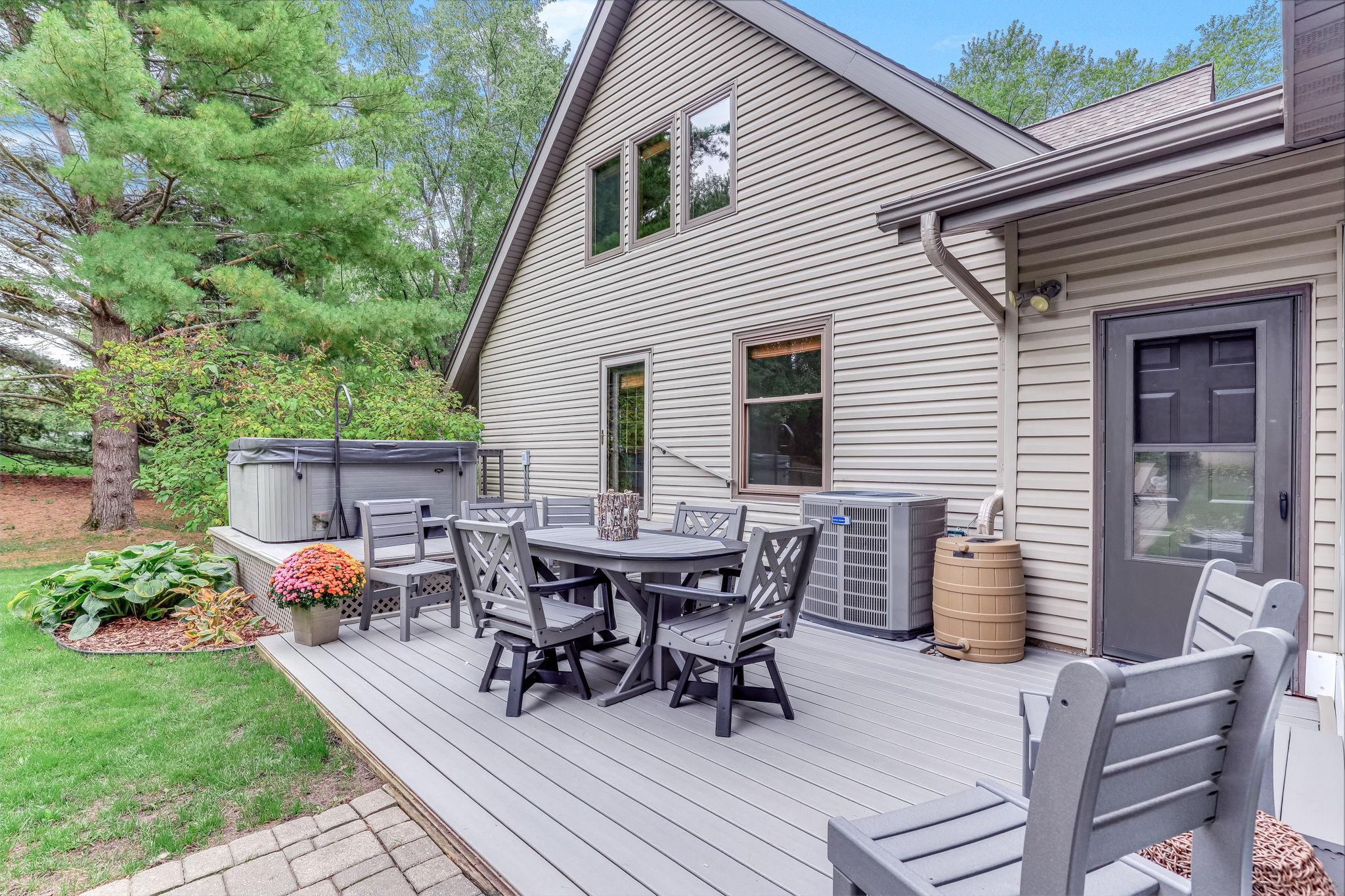 Private back yard deck. Maintenance free Trex decking her and on front porch.