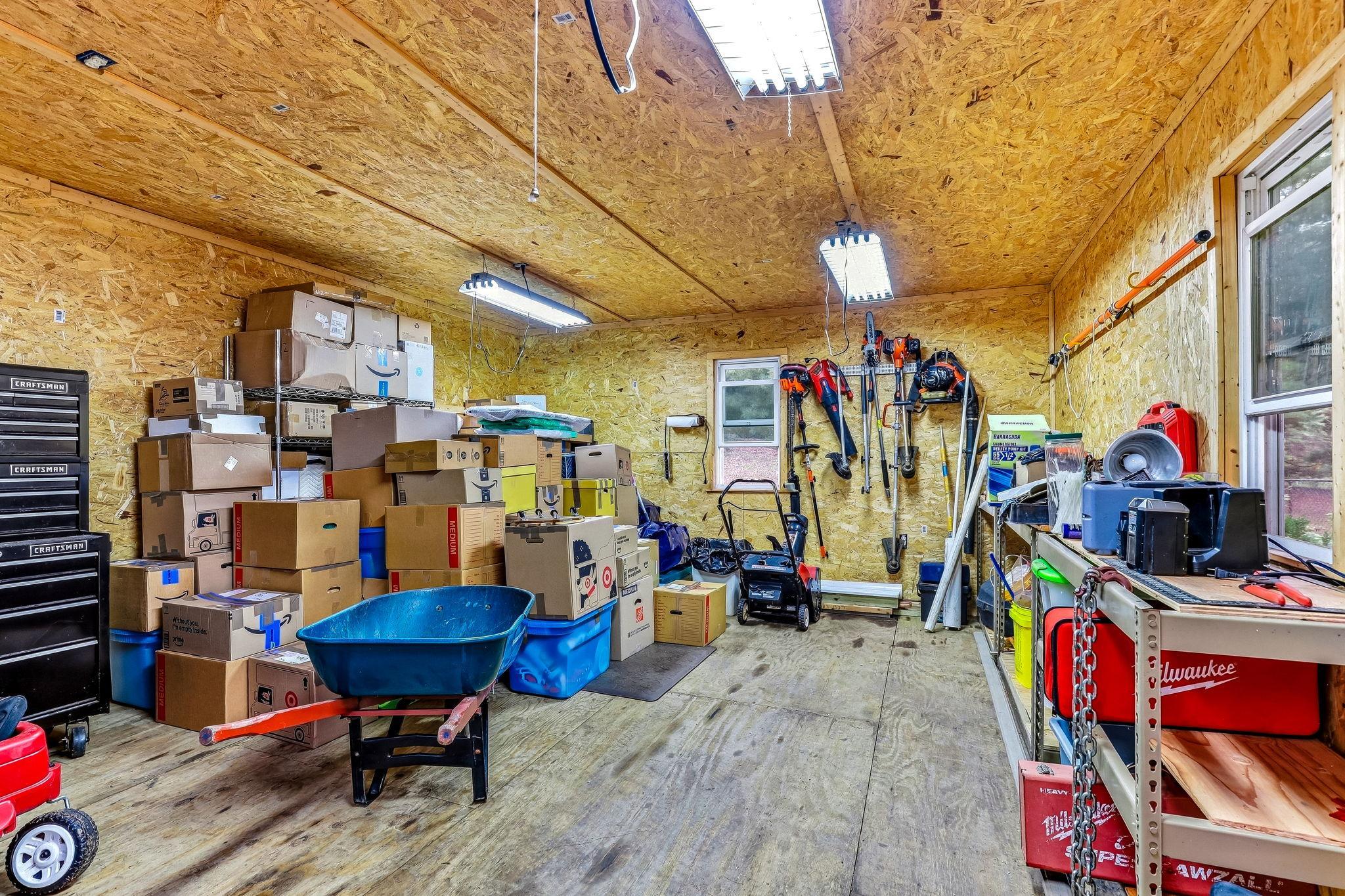 Here is the inside. All insulated, full power. Was previously used as a woodworking shop but great space for whatever your needs are.