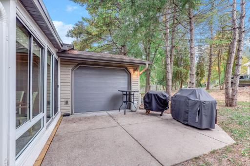 3rd garage stall has an overhead door out the back as well.