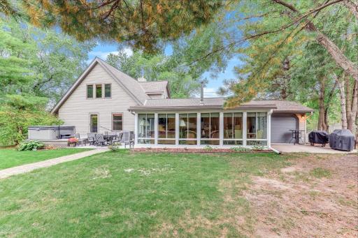 Notice the 3 season porch. Fantastic space.