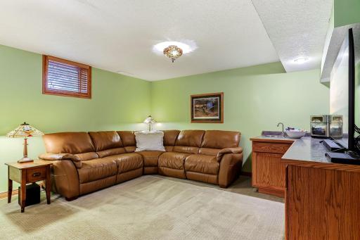 Lower level rec area with great seating for movies and games