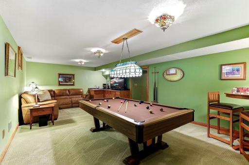 Lower level rec area. Pool table will stay.