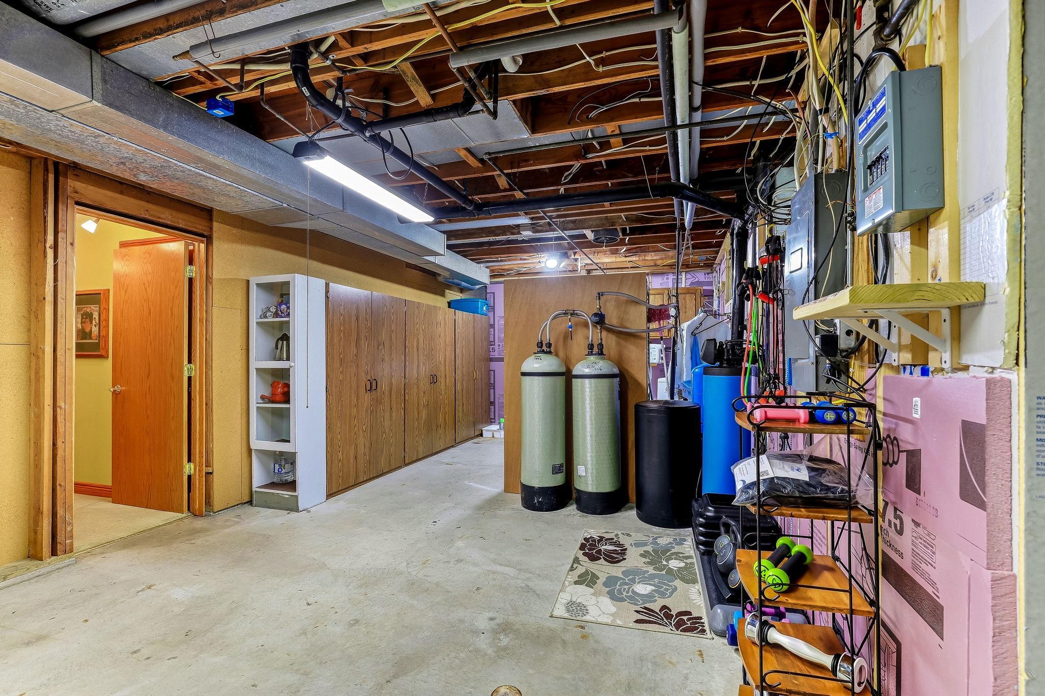 Tons of storage space in this lower level. See floor plans for dimensions and layout. Notice carbon filtration system in the background. All part of the 3M settlement with the state of MN. The system is provided and maintained at NO expense!
