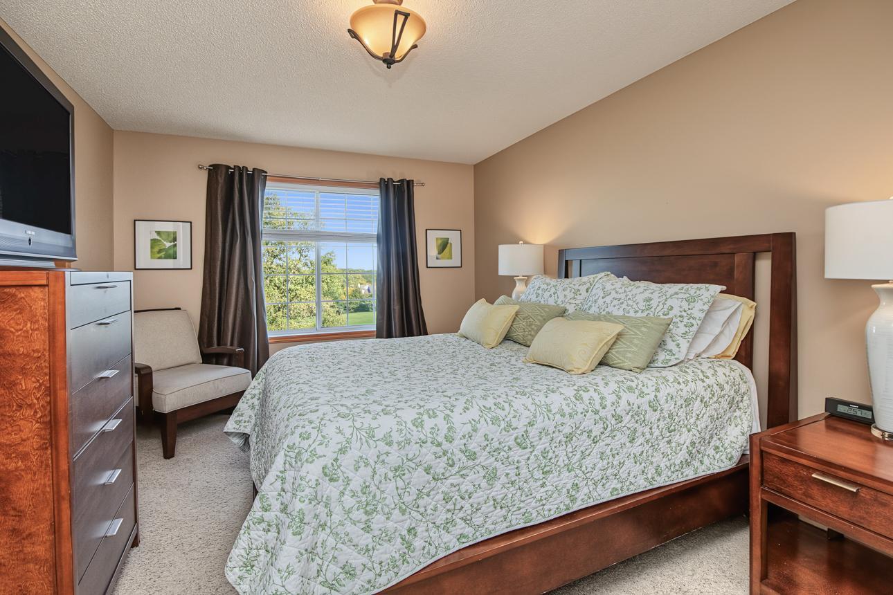 Primary bedroom is well sized and overlooks the golf course