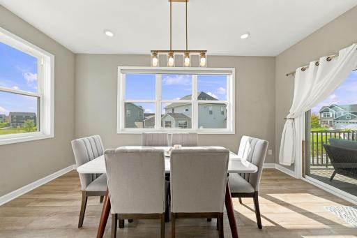 Dining room with sliding patio door leading to the deck.