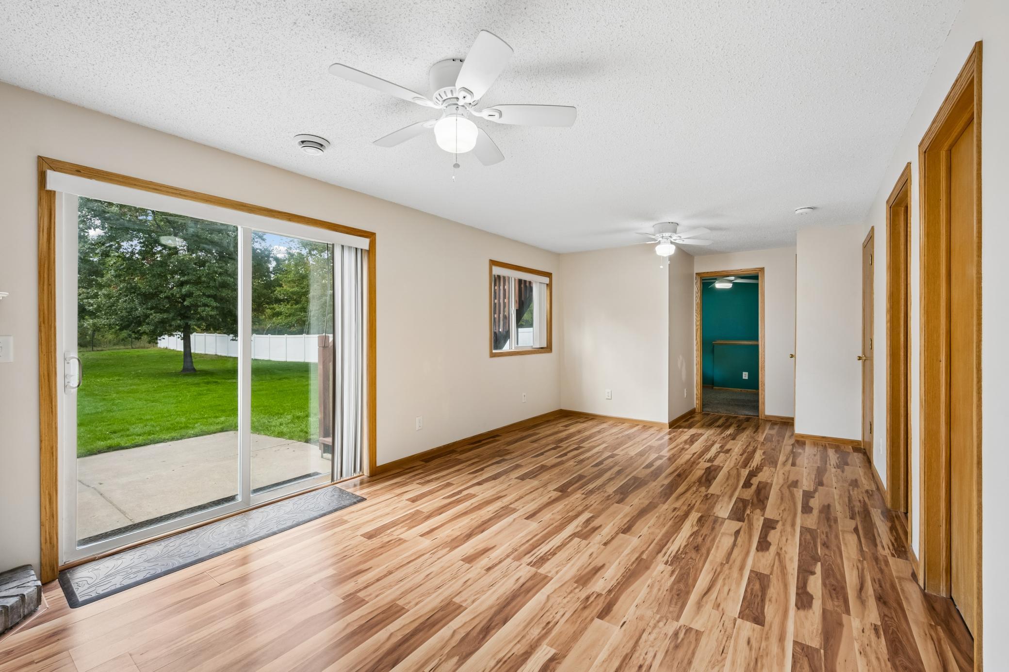 Lower level walk out rec room with great storage under the stairs.
