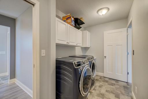 Well-appointed upper-level laundry making everyday living even easier!