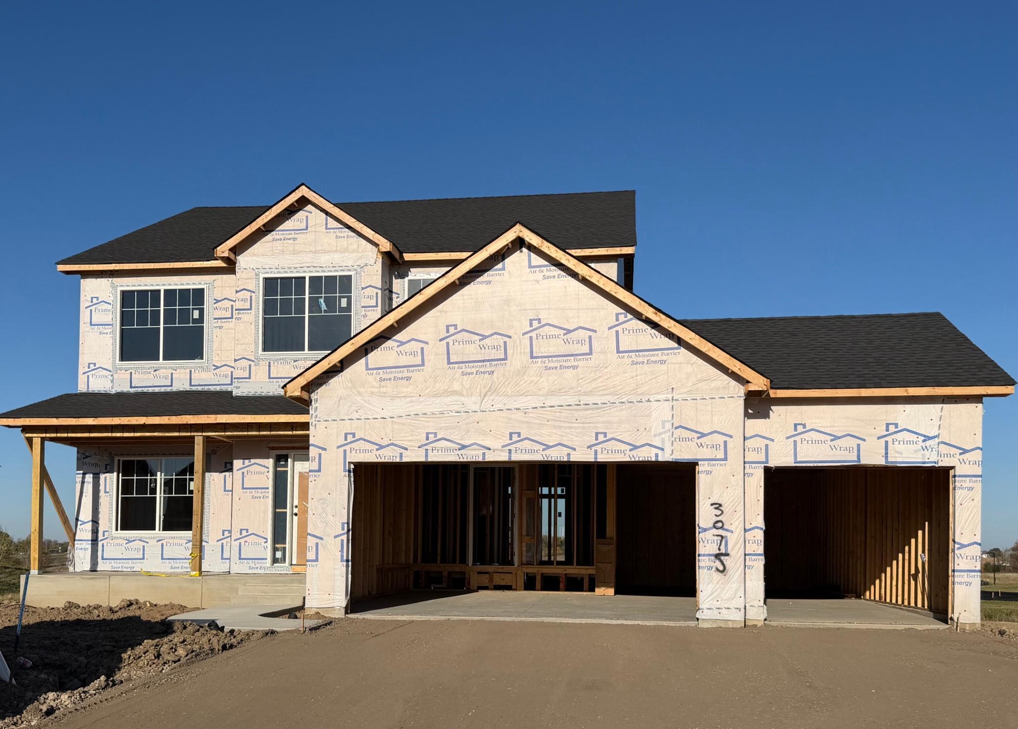 3075 Jandura Ave NE- Photo of home currently under construction. Siding will be installed soon.