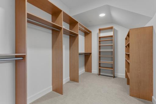 Primary Walk-In Closet with Custom Built-Ins