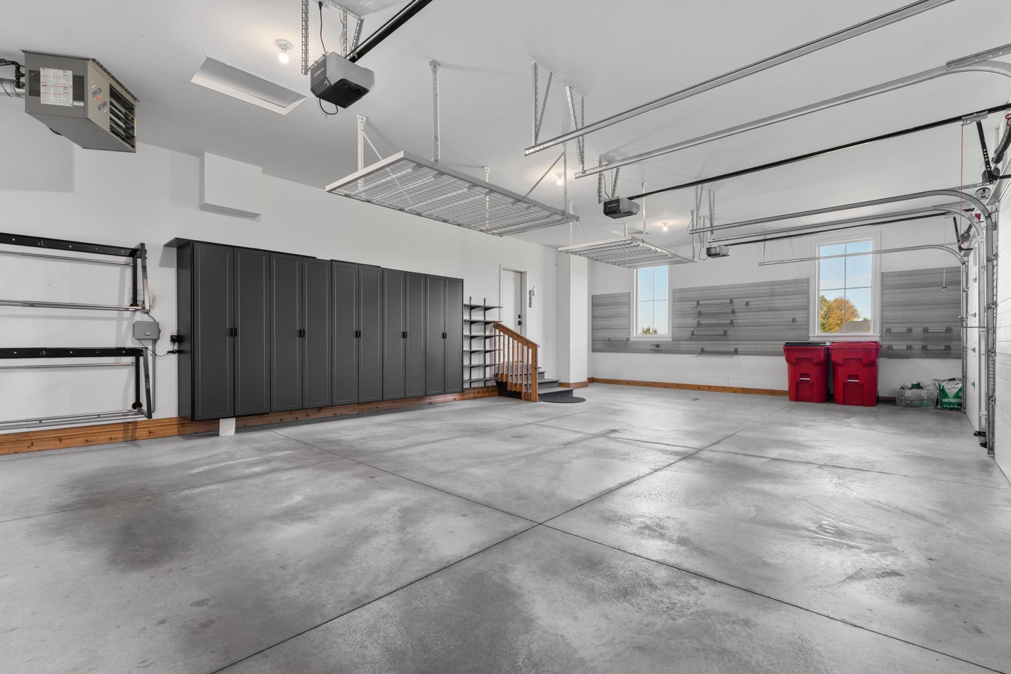 Three Car Garage & Custom Storage Cabinets