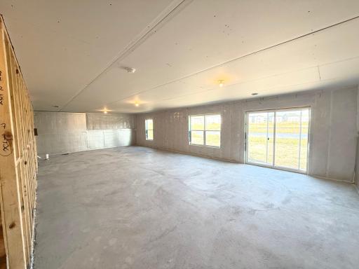 Photo From Actual Home: Large Walkout lower level, perfect for a future Family room, bedroom, and bathroom.