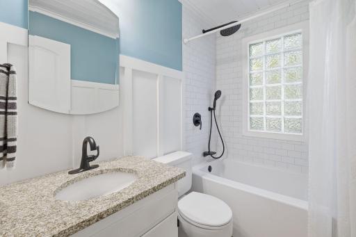 Beautifully updated full bath w/hand held shower