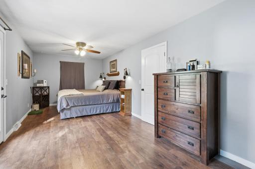 Primary bedroom has plenty of space for large furniture.