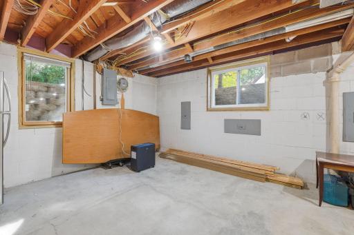 Large egress and double windows w/potential for a 5th bedroom or family room.
