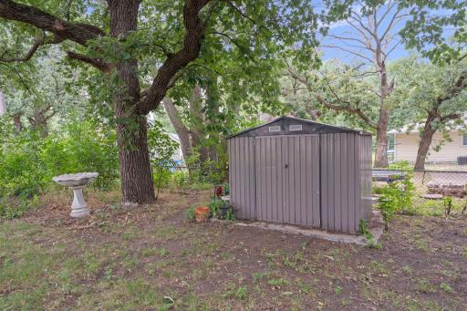 Fully fenced in backyard and newer storage shed for tools, bikes and outdoor essentials.