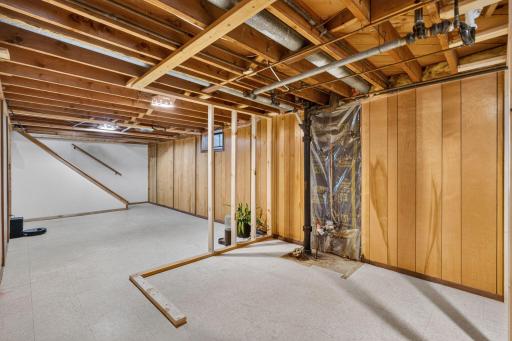 Future bathroom and family room. Ready for your vision!