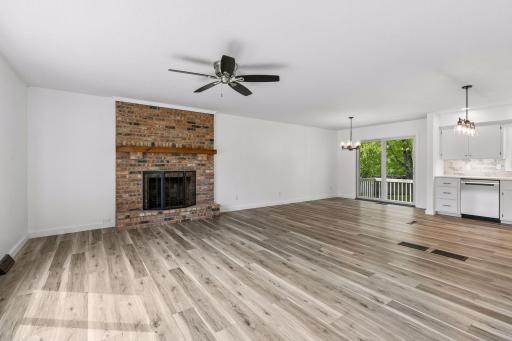 Living area is centered by a cozy fireplace