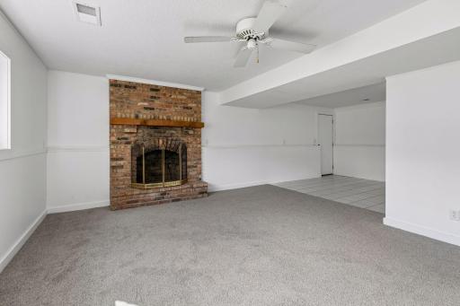 Family room opens to flex area that is a perfect home office, work out space or playroom
