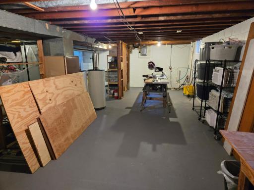Dedicated workshop area with ample room for woodworking, tools, hobbies, and DIY projects.