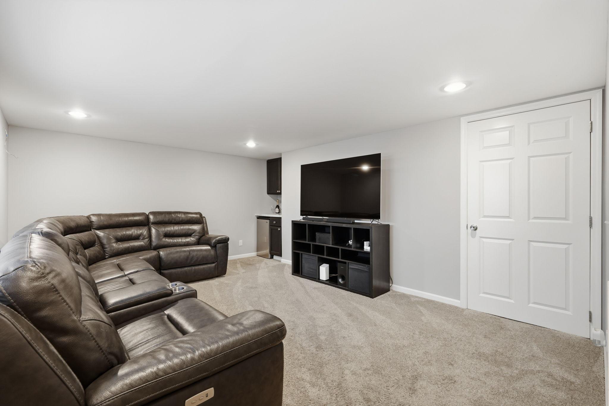 Another view of the family room area... check out the quaint bar area in the corner .. YES!