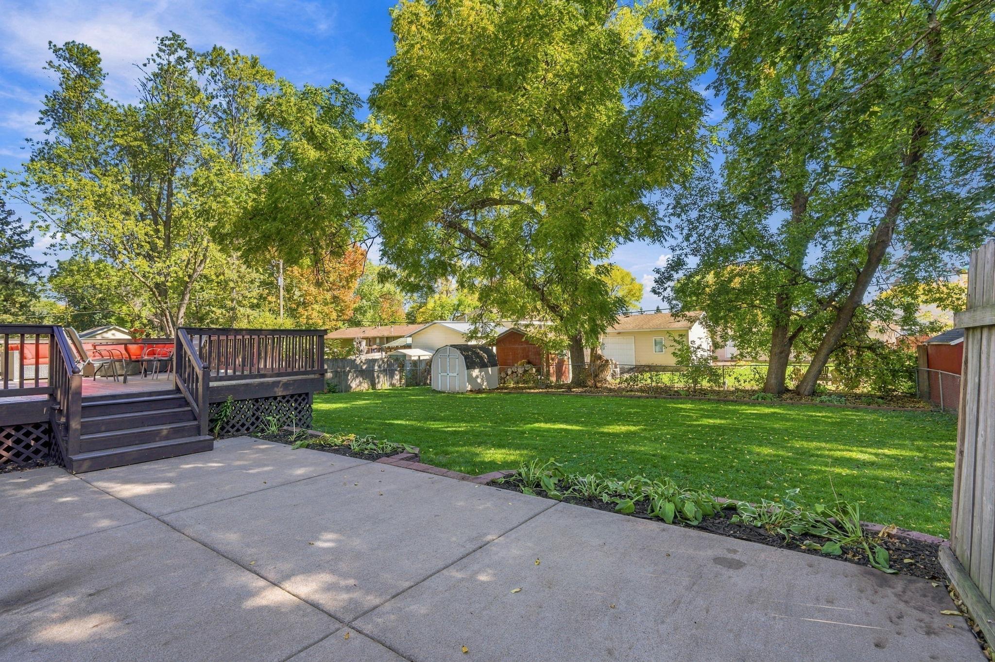This patio space offers peaceful backyard views... ENJOY!