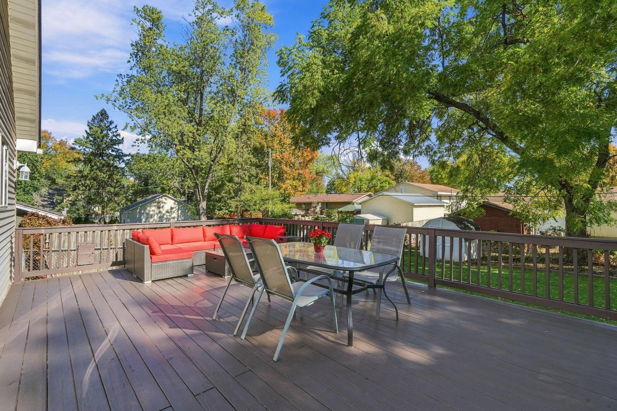 Awesome, spacious deck!! Overlooking the level backyard, this deck offers a wonderful place to soak up some Fall sunshine or enjoy a weekend lunch right here!