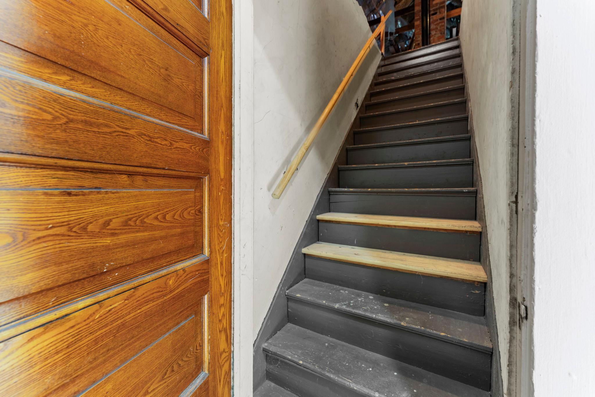 Stairs to upper level attic