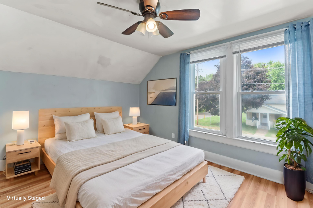 Virtually staged upper level bedroom