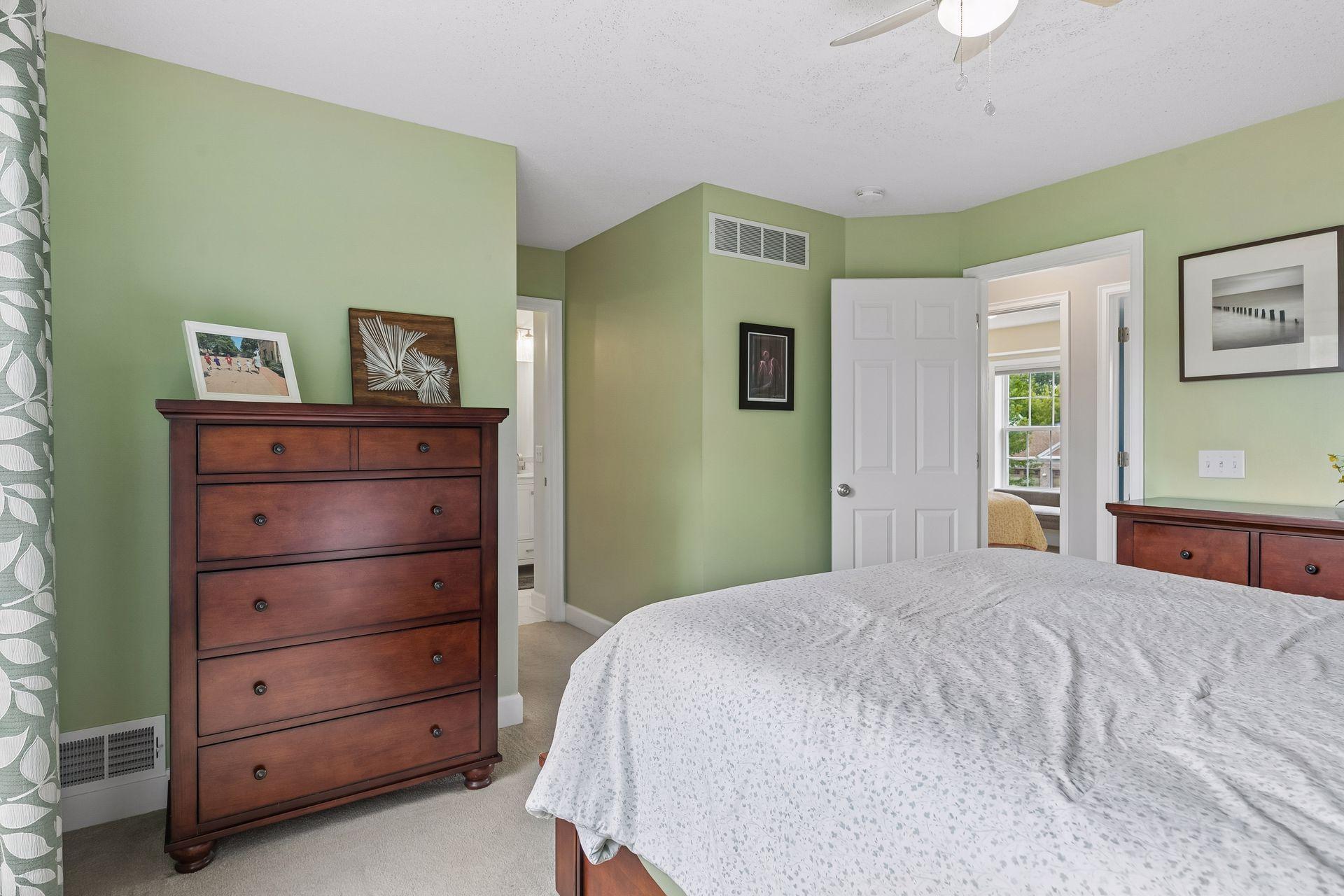 A generous walk in closet and private 3/4 bath complete this primary suite.