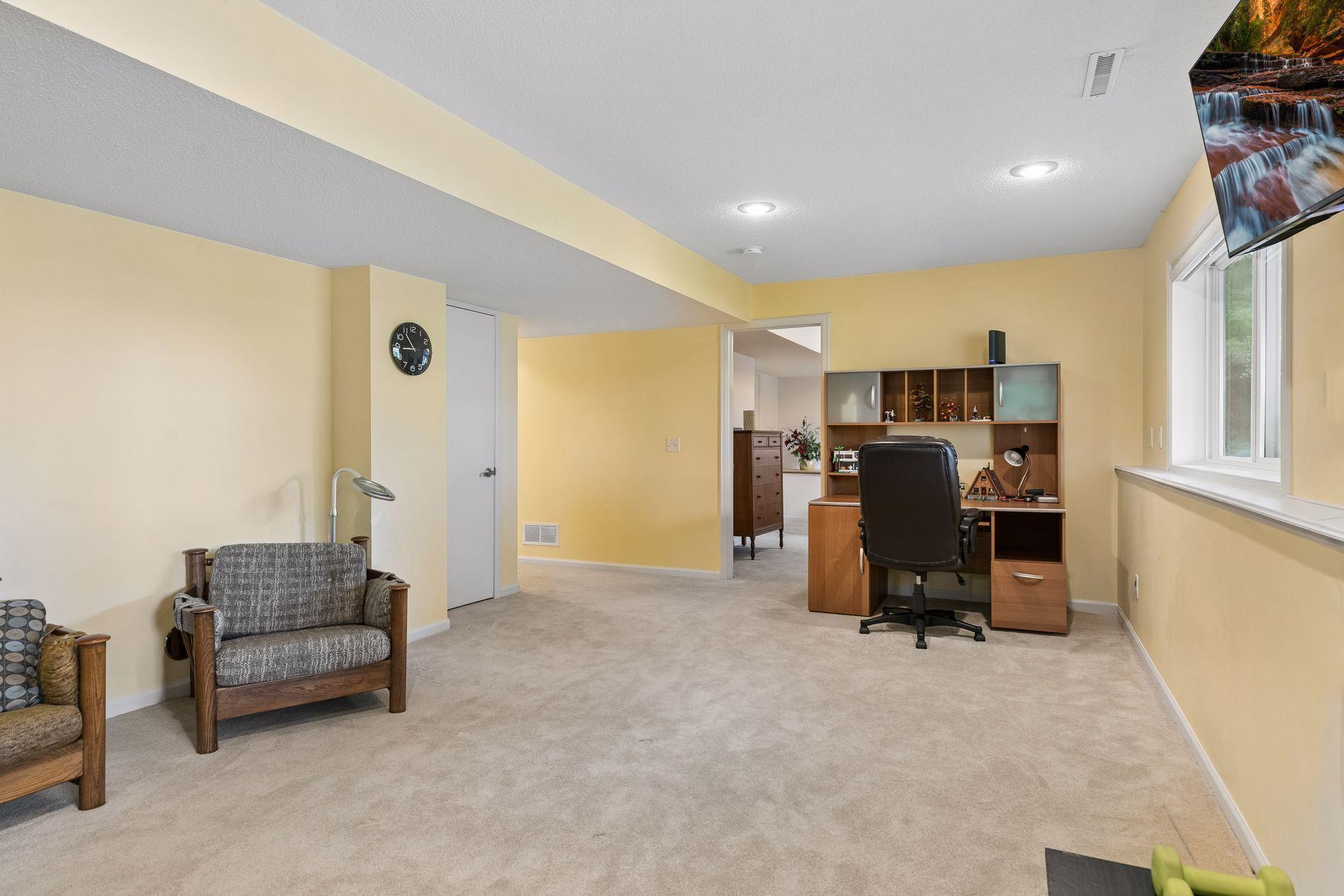 Another view highlights access to the lower level bedroom and smart under stair storage for keeping everything organized.