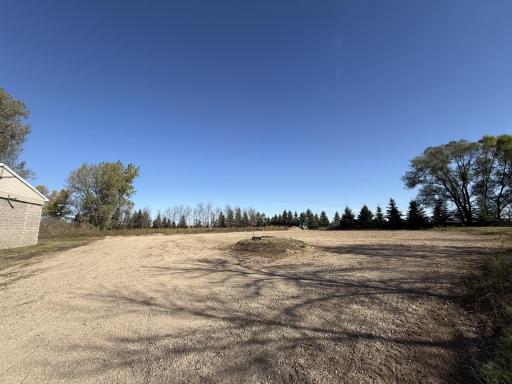Large parking area (crushed concrete) and room to expand!