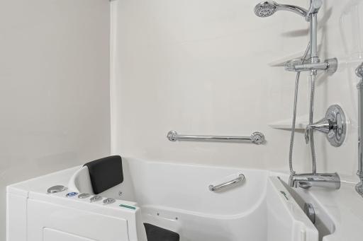 The luxury you deserve. Padded seating, jets, rain shower and handheld shower head.