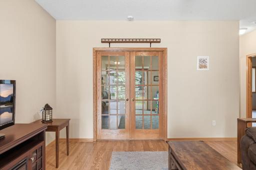French doors lead to the den or second bedroom