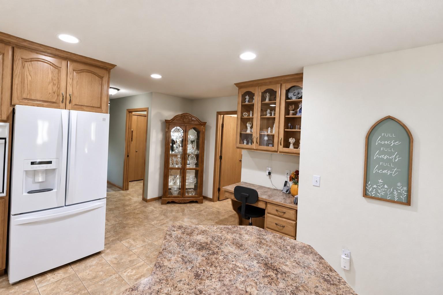 Built-in desk area off the kitchen, near the bathroom, and laundry room.