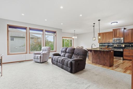 Open floor plan creates a seamless flow between the living, dining and kitchen space.