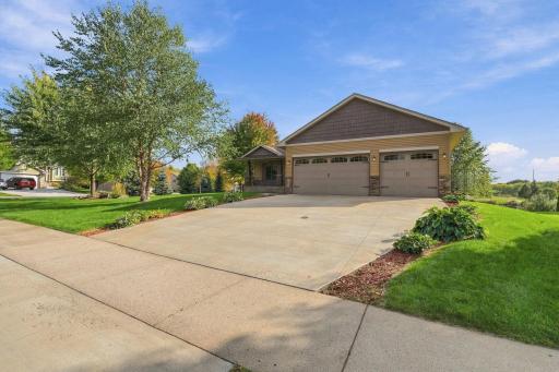 Large and level concrete driveway offers plenty of room for parking