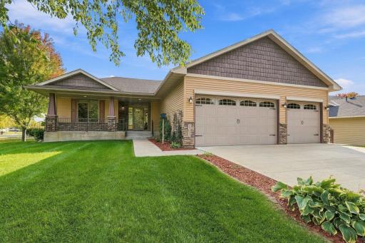 Charming covered front porch creates a warm and welcoming first impression.