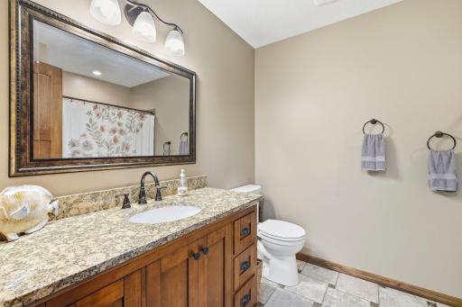 Another full bath to be shared in the lower level.