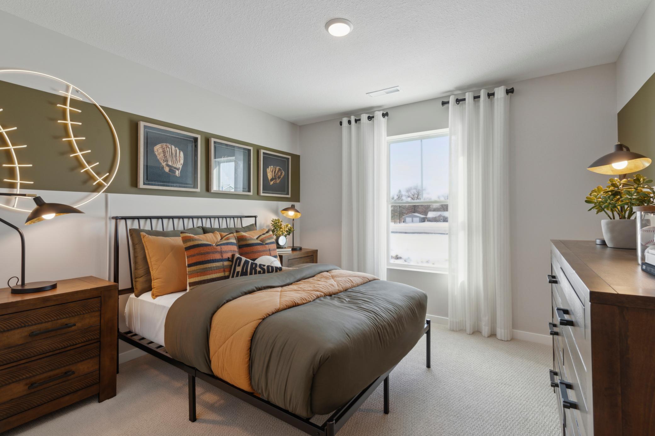Flexible in its use, this guest bedroom can easily serve as a cozy retreat, home office, or additional sleeping space as needed..jpg