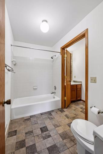 The walk through full bath has a door for privacy.