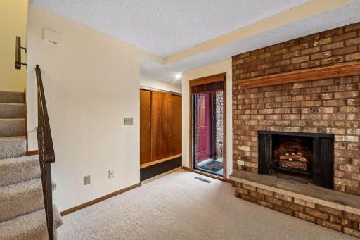 1/2 bath is located to the left of the closet doors.