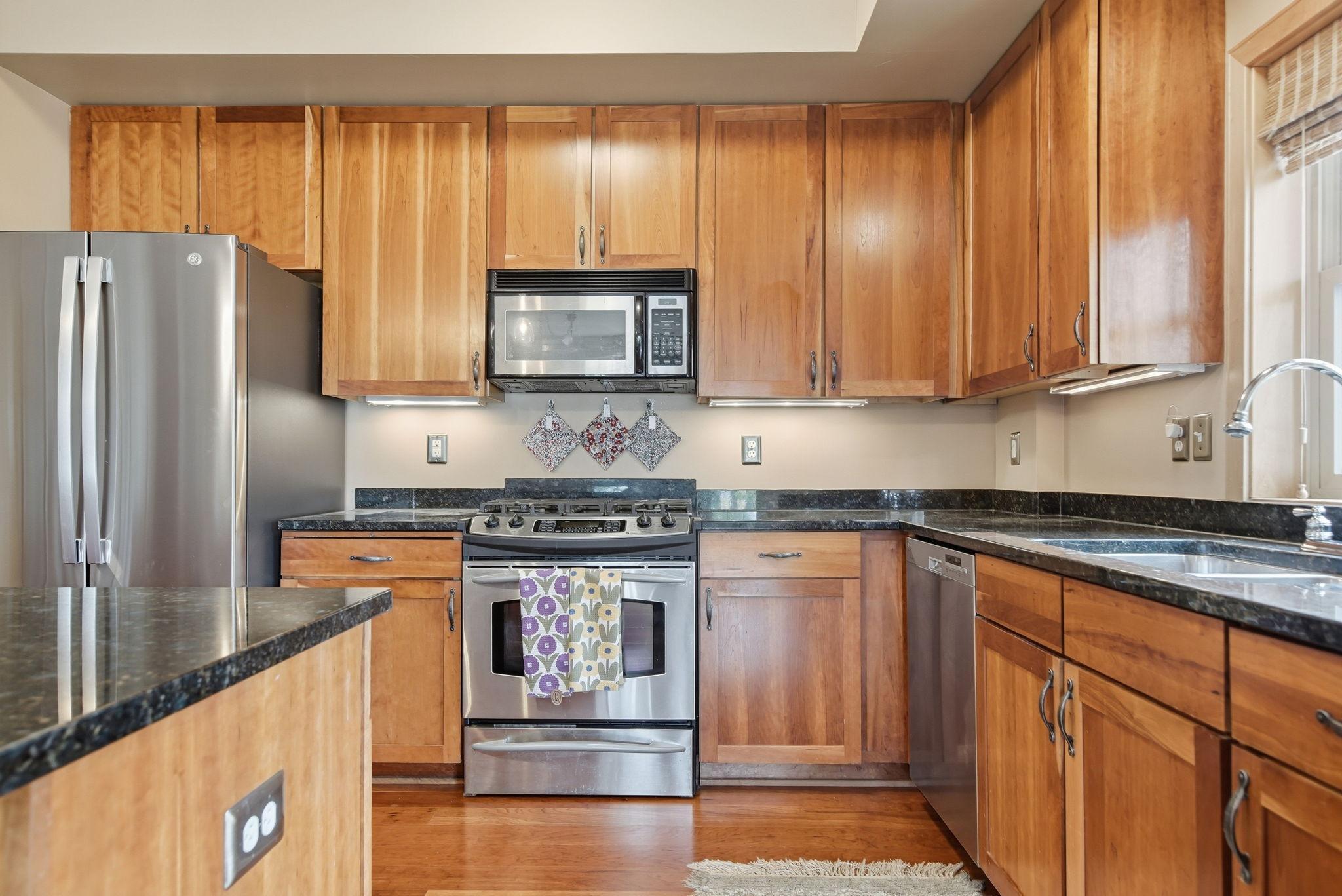 Kitchen has upgraded Cherry cabinets