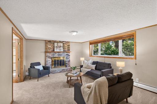 In the lower level you can cozy up by the fire, settle in for a movie, or gather around for a game night â this space was made for making memories.