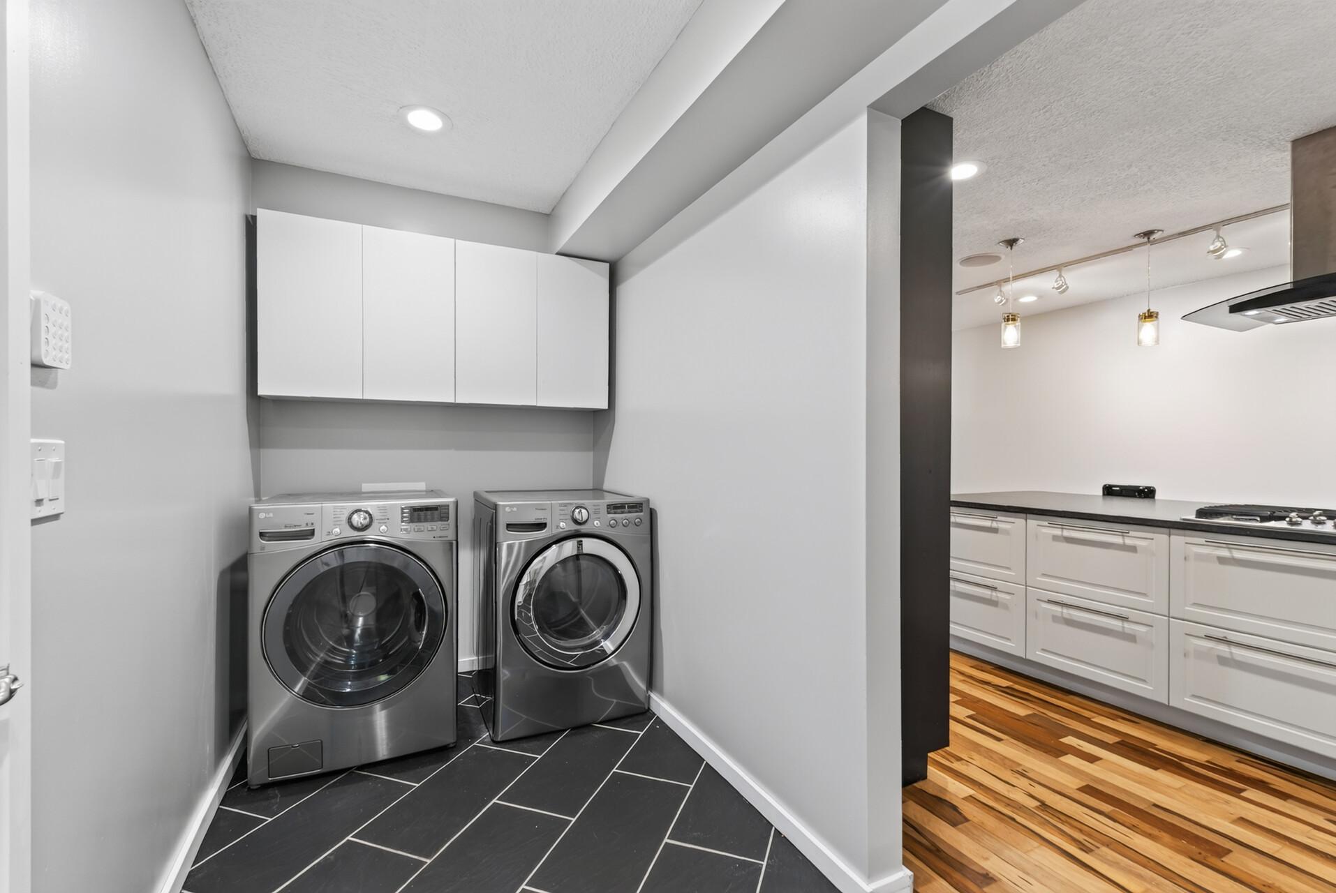 Mudroom/Laundry Room between Garage and Kitchen.