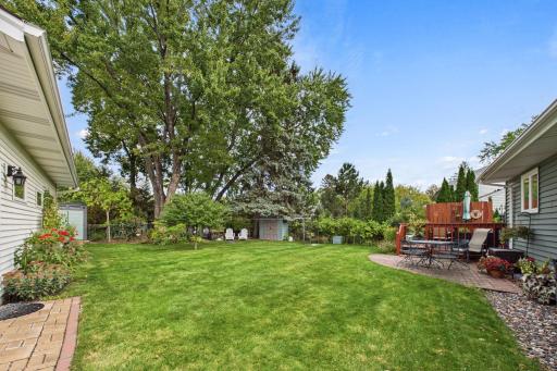Large flat backyard with beautiful deck and patio! Your own private sanctuary!