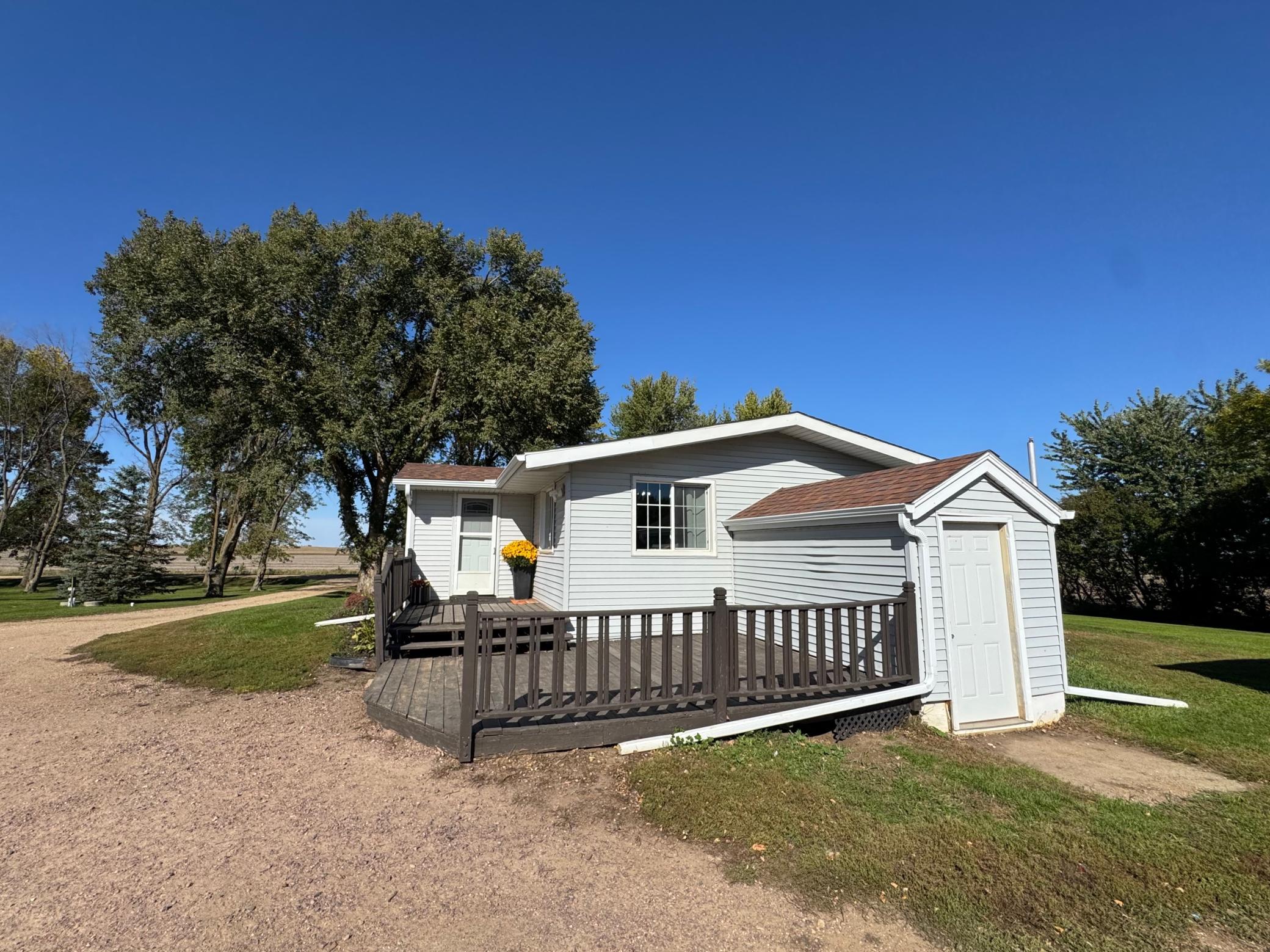 Another view of house & 2nd access to basment