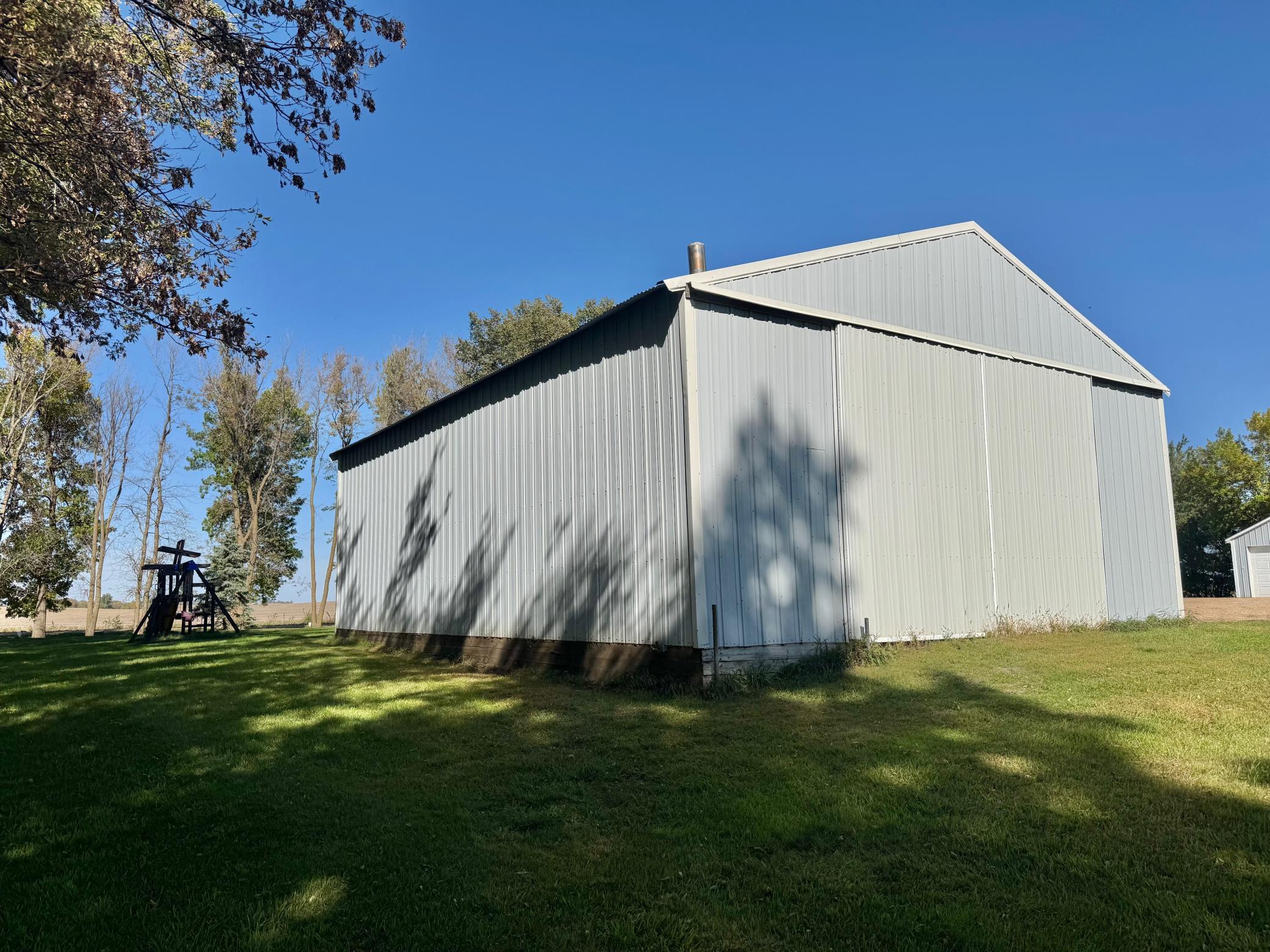 Pole shed includes an overhead door